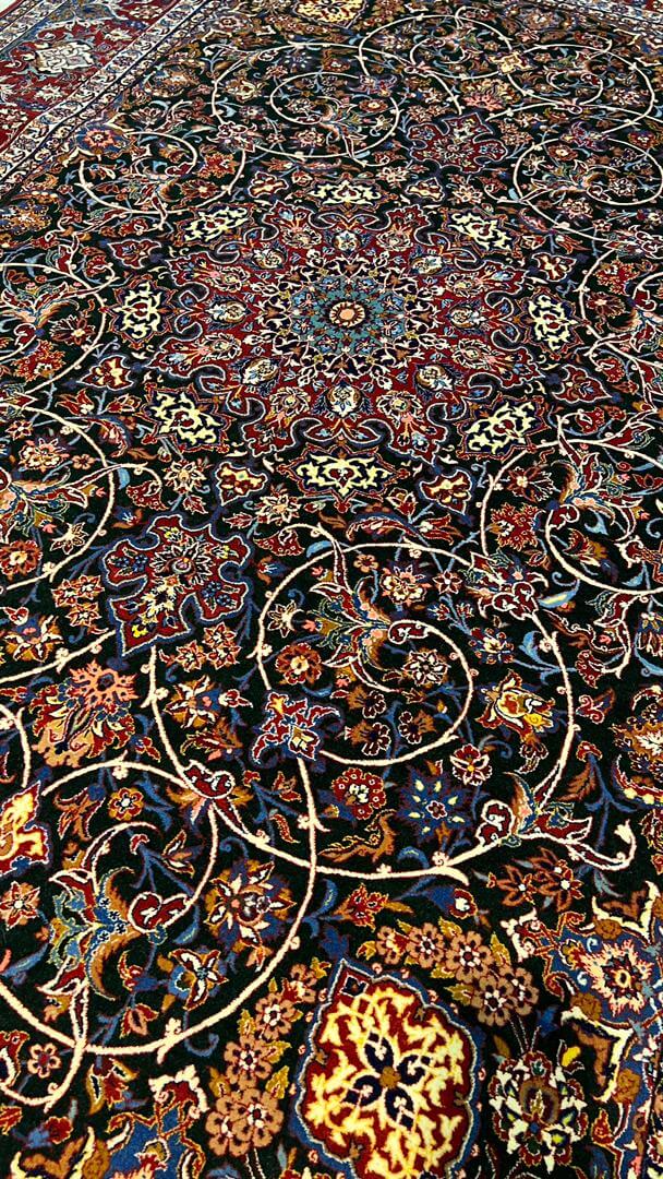 "Side view of the Seirafian carpet showcasing its soft wool and silk pile."